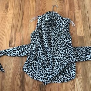 Sleeveless animal print button down